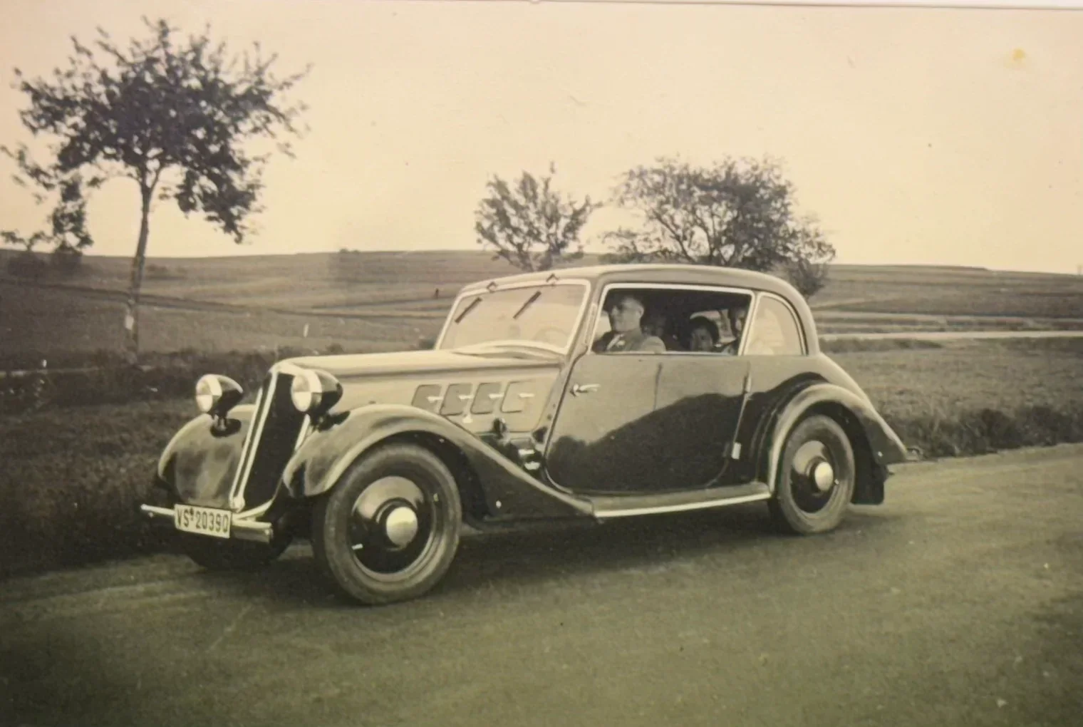 Historic car on a road, Roth family archive